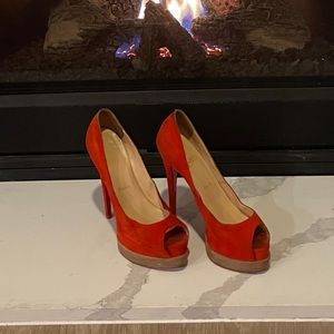 Gorgeous Red open toe Loubi’s.